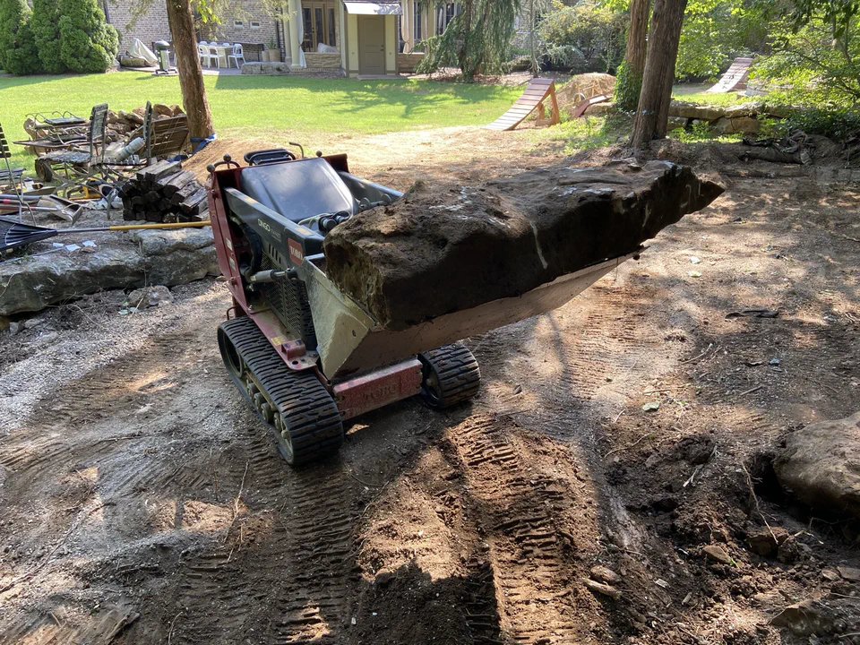 Excavation — moving dirt for the pad.