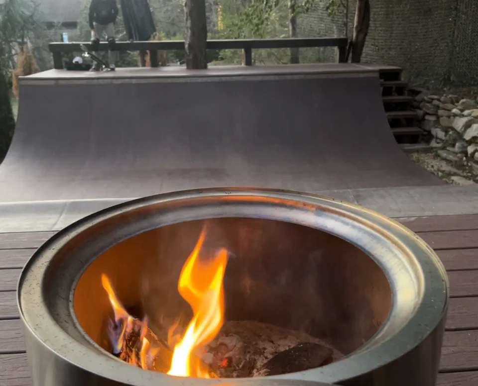 Dusk, the rebuilt ramp with on-deck fire pit.