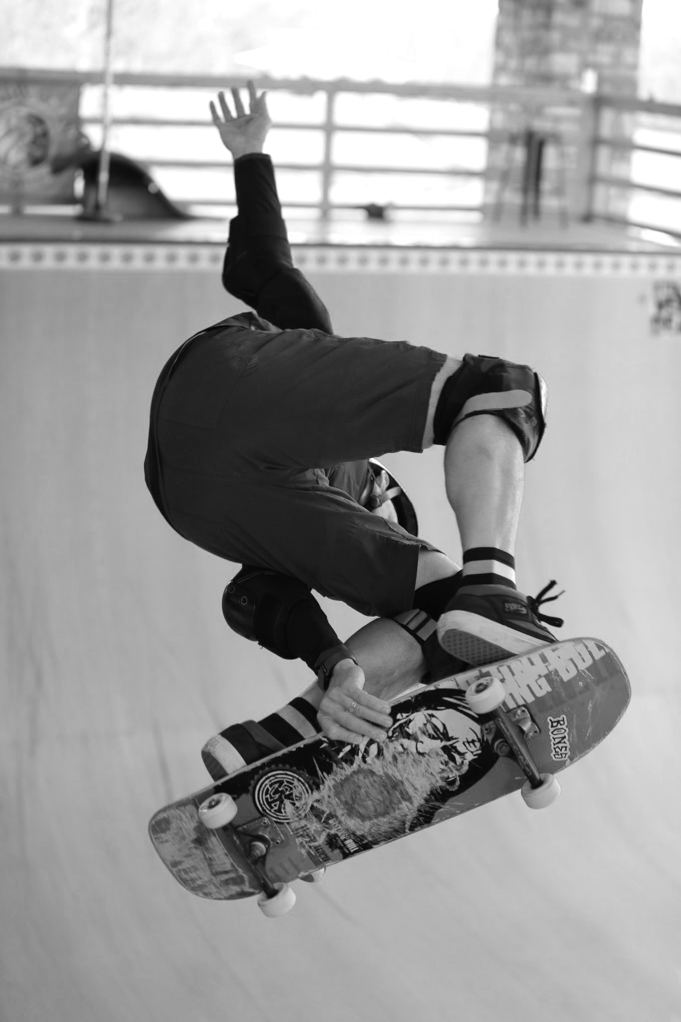 A more recent photo of Michael in skate clothes, leaning against a half-pipe.